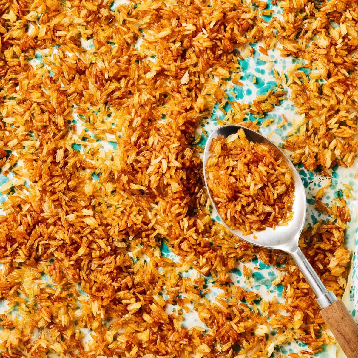 Crackly crispy rice in a glass bowl, dark background