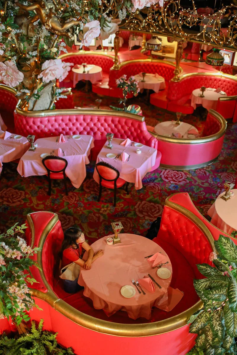Pink exterior facade of the Madonna Inn hotel