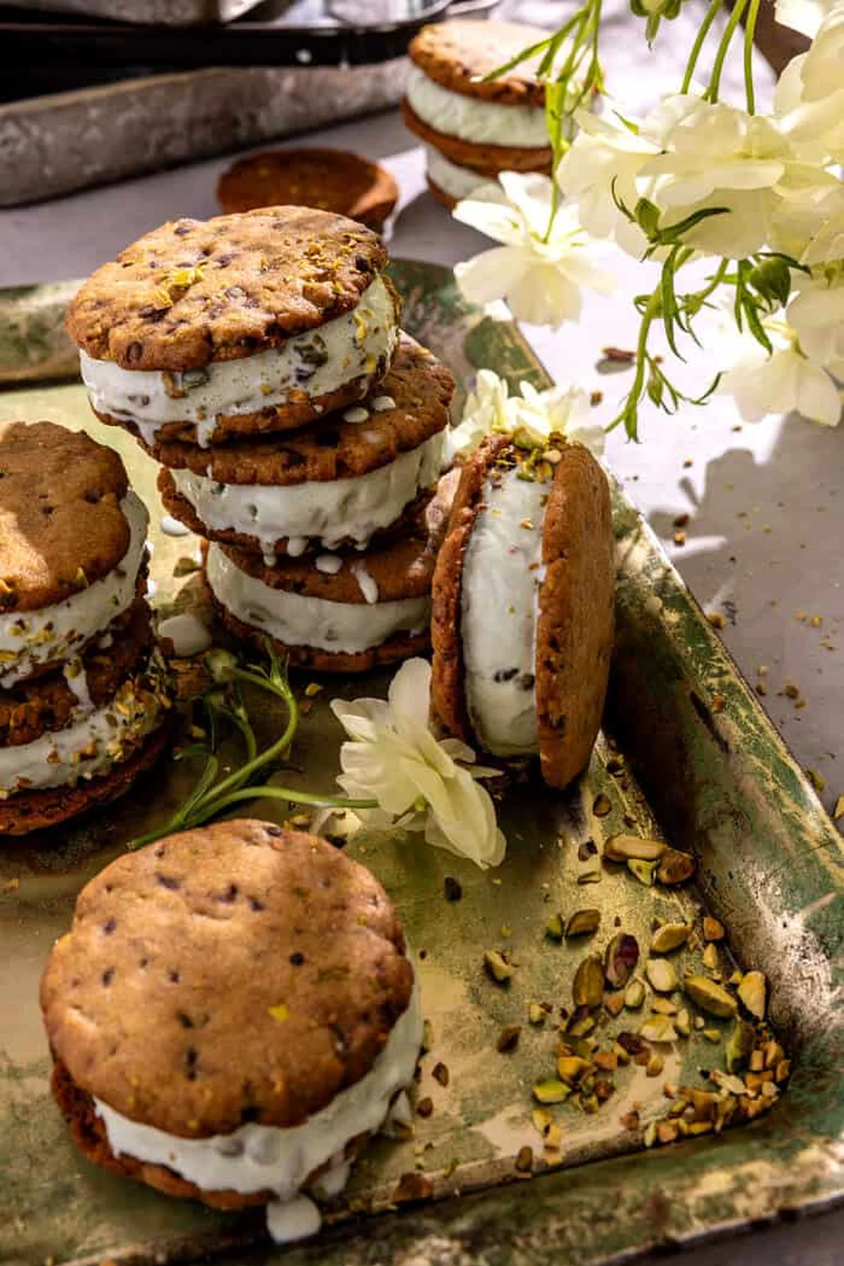 Stacked pistachio ice cream sandwiches from a second angle