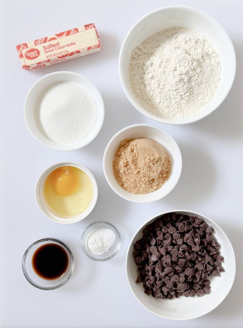 Cookie baking ingredients arranged on a white surface