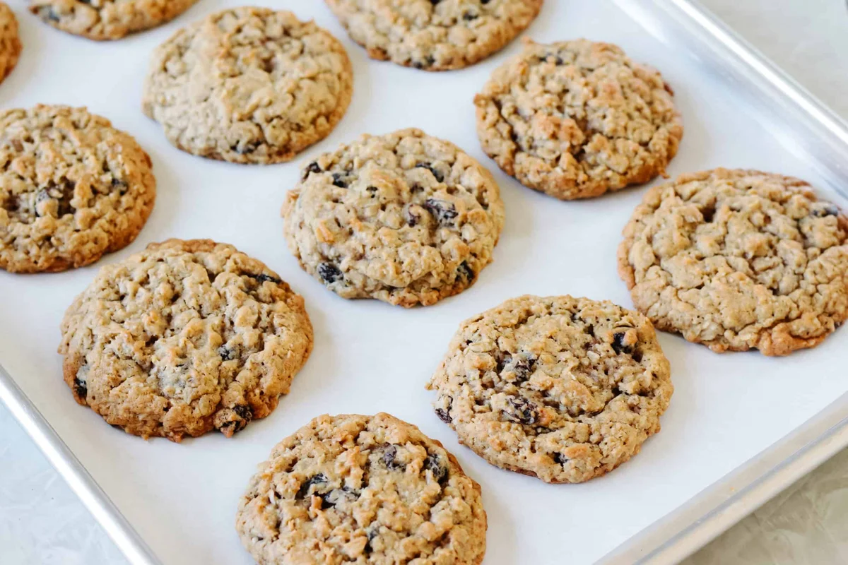 Oatmeal raisin cookies cooling on a wire rack