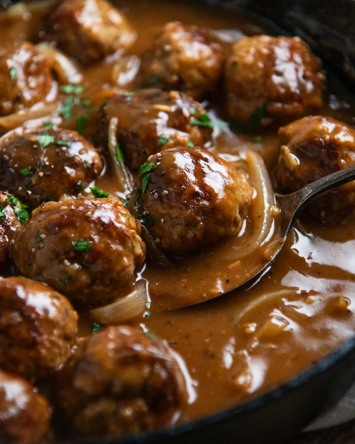 Meatballs in glossy onion gravy, ready to serve