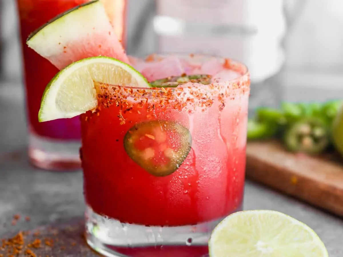 Frozen watermelon margarita in a salt-rimmed glass