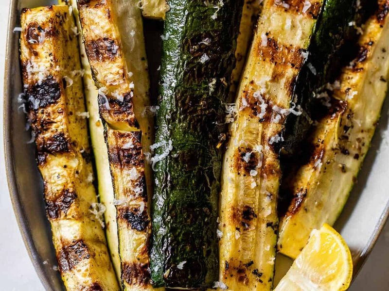 Grilled zucchini with Parmesan cheese and fresh herbs