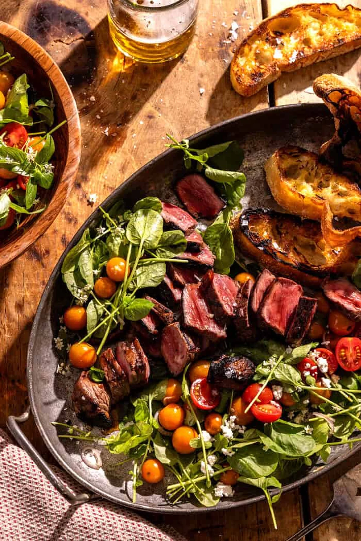 Honey soy marinated steak sliced on a serving platter