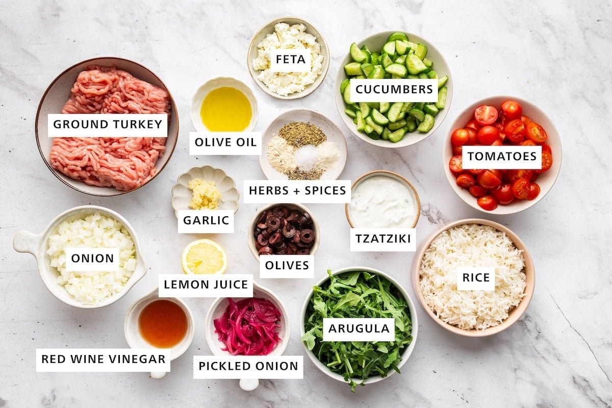 All Greek turkey bowl ingredients arranged in labeled bowls