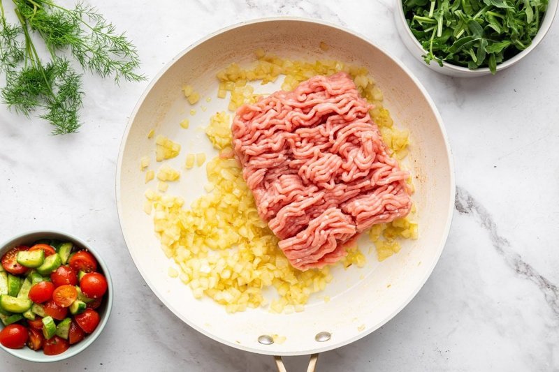 Ground turkey browning in the skillet with onions